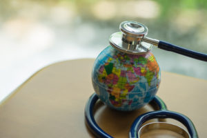 Stethoscope on mini global ball.